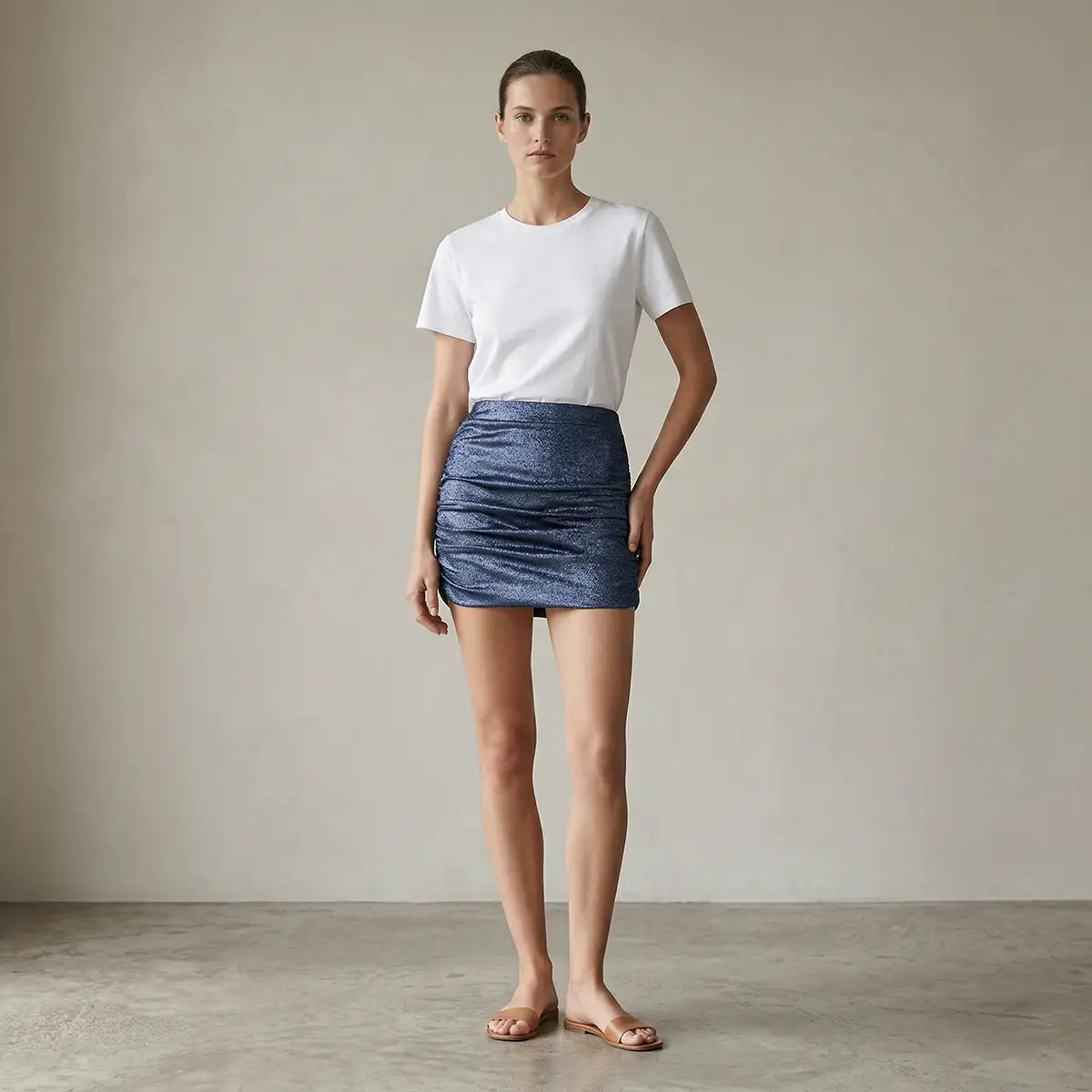 minigonna NINA di Alessandra Gallo in lurex blu con arricciature drappeggiati - indossata frontale - Stardust Collection