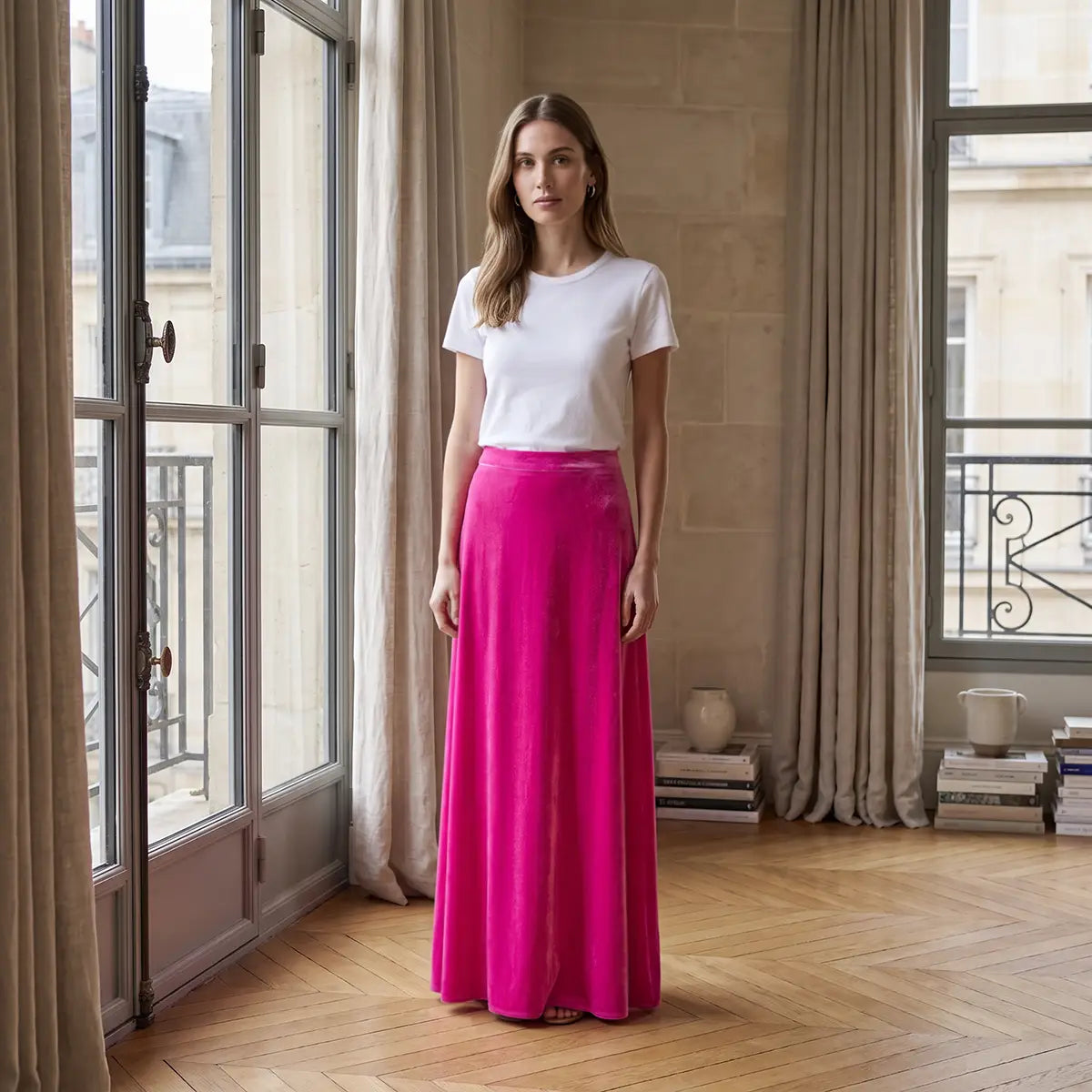 TOSCA, gonna lunga in ciniglia fucsia con linea svasata, su modella.