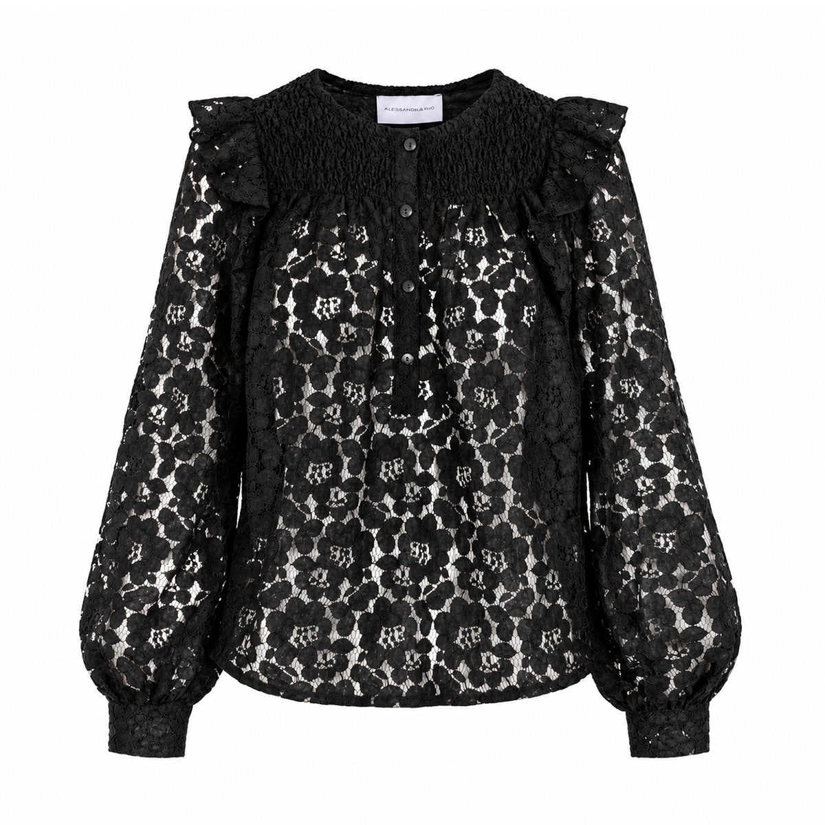 ARYA, camicia in pizzo nera con rouches sulle spalle e maniche a palloncino.
