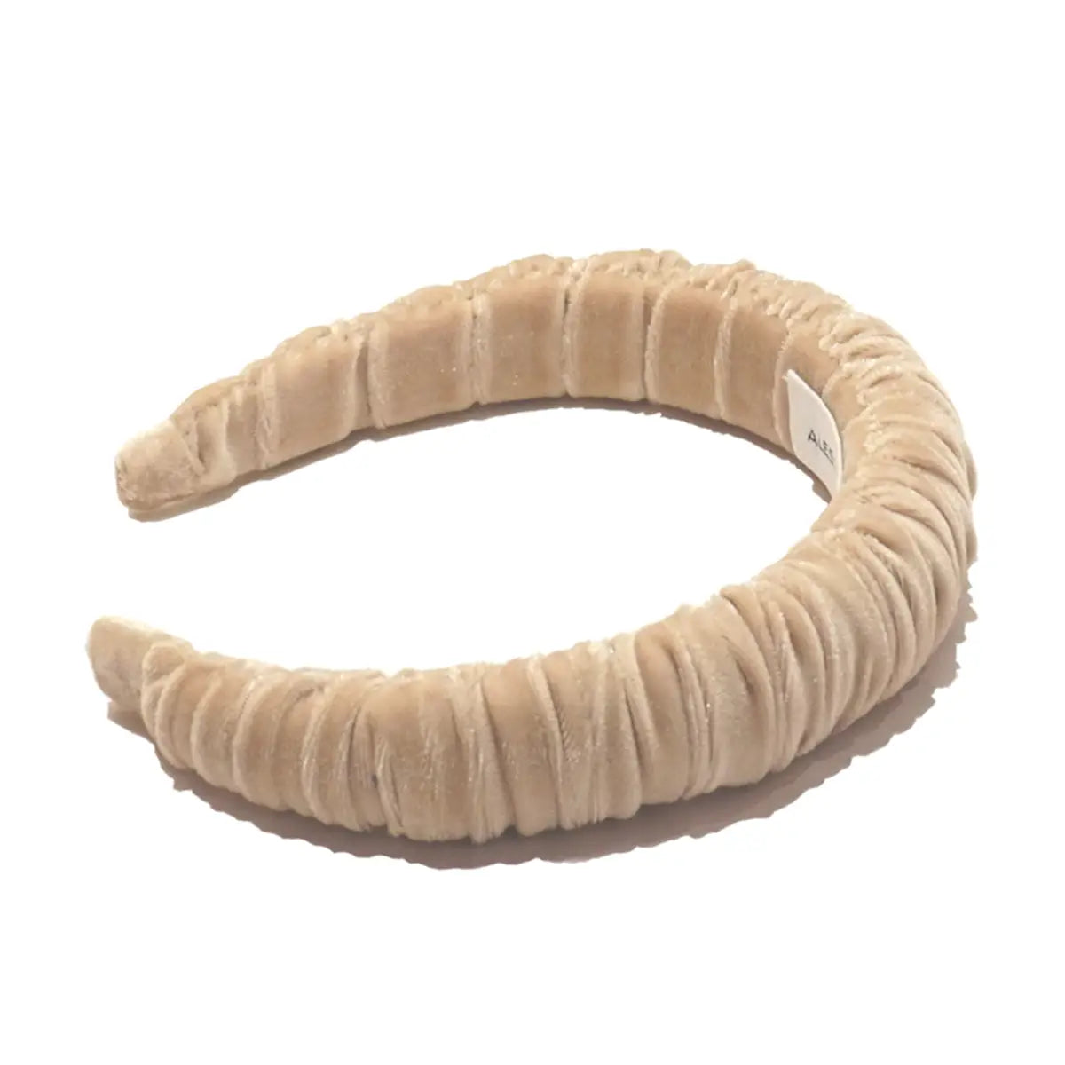 Cerchietto goffrato in ciniglia beige.