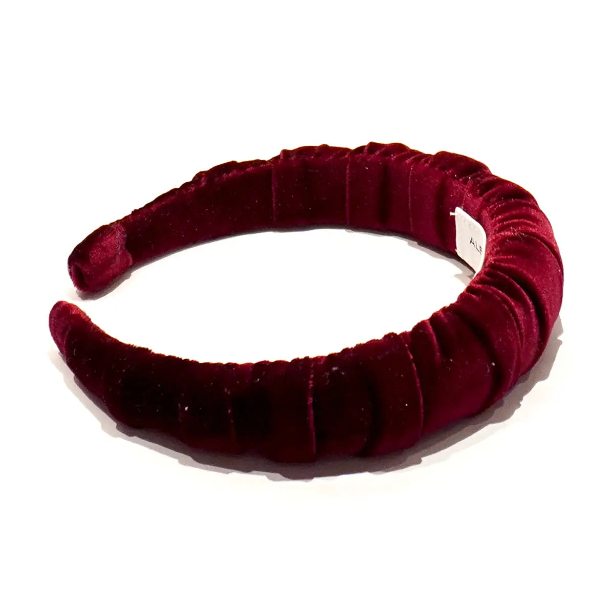 Cerchietto goffrato in ciniglia bordeaux.