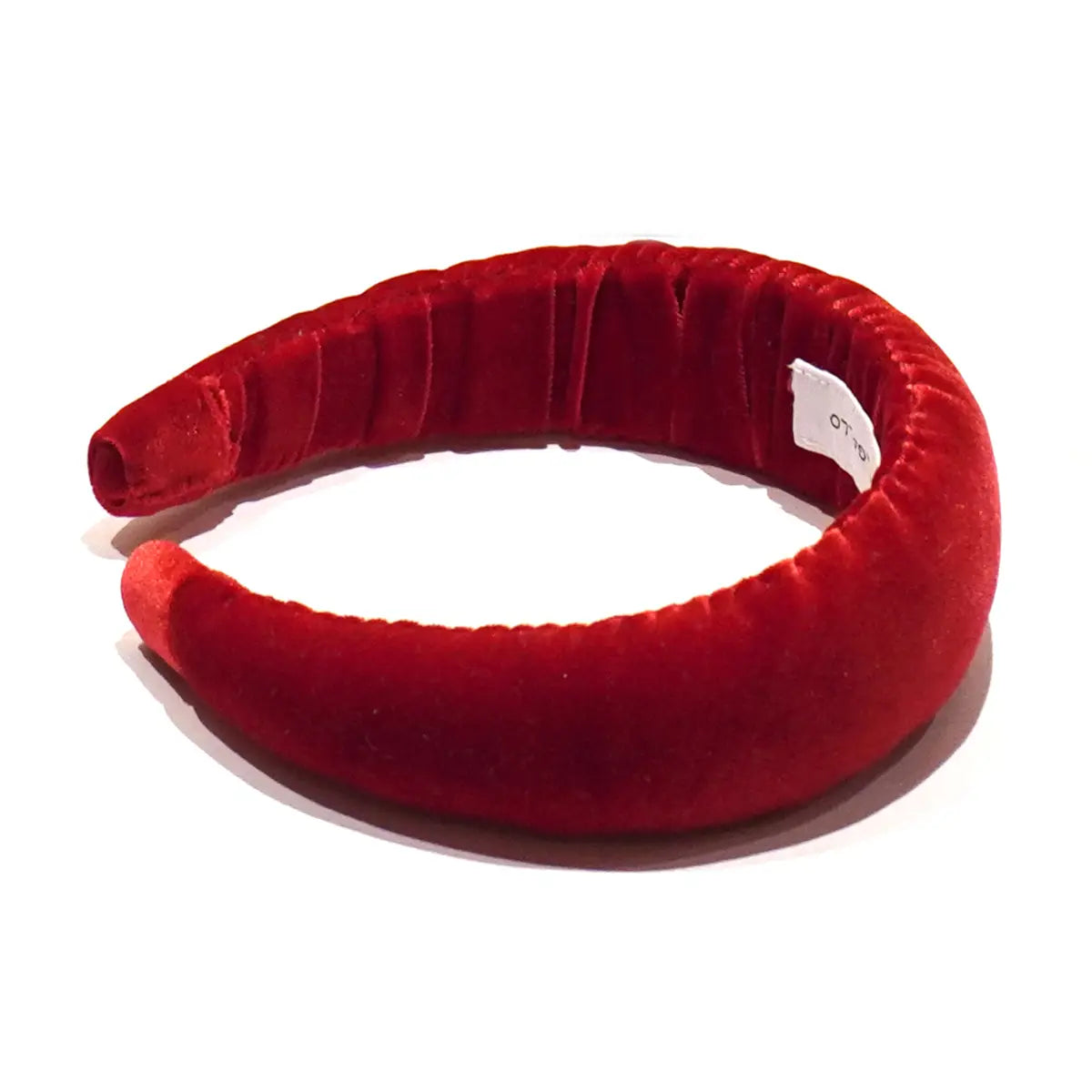 Cerchietto liscio in ciniglia rossa.