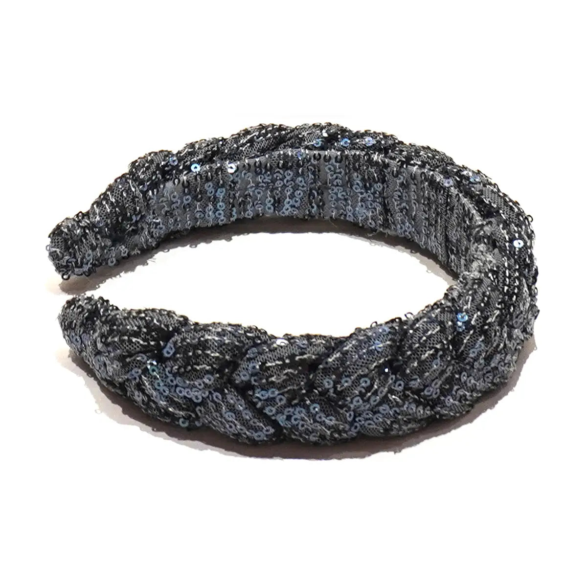 Cerchietto a treccia in paillettes azzurre.