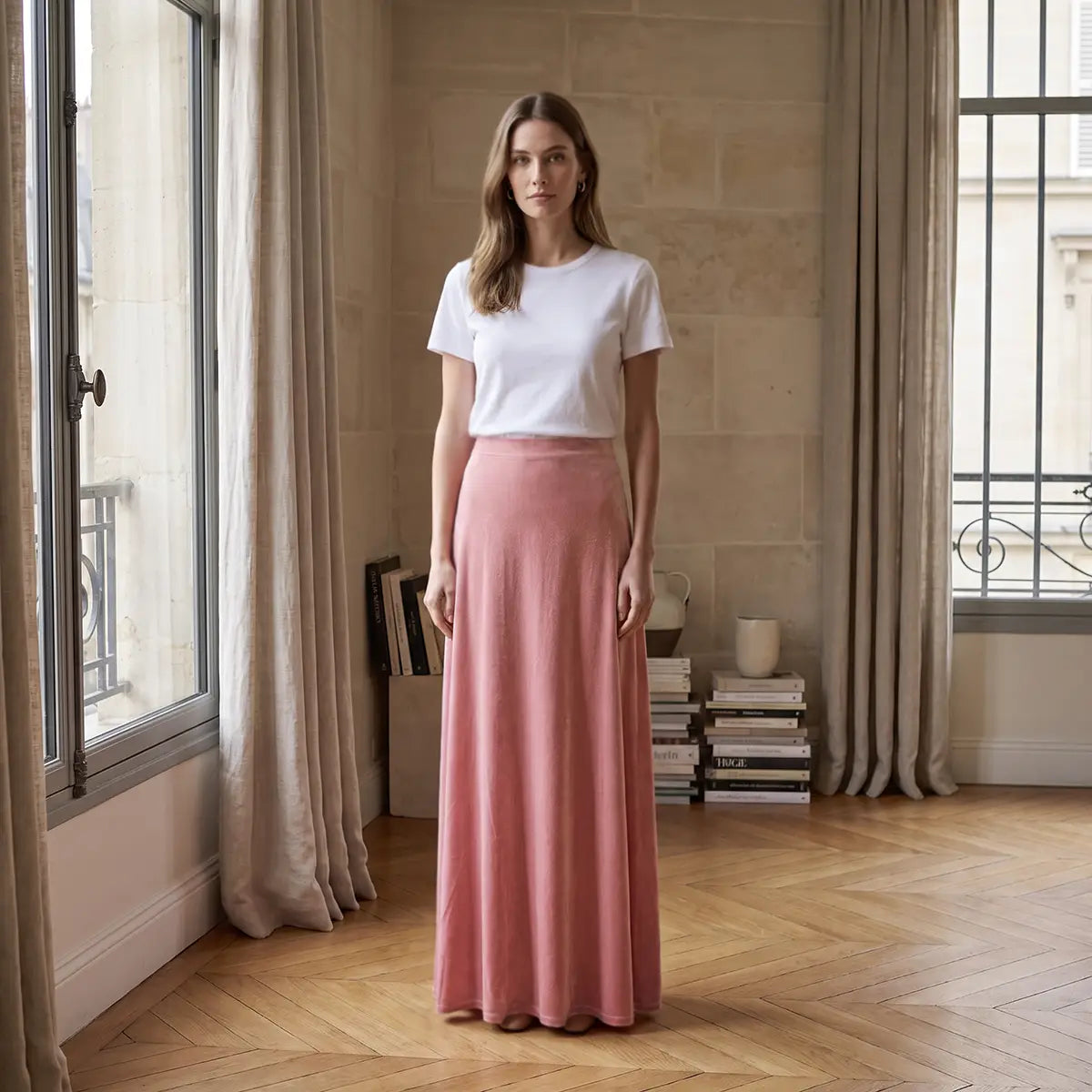 TOSCA, gonna lunga in ciniglia rosa con linea svasata, su modella.